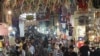 Iran – Iranian people walk around the Tehran Grand Bazar (Market), as symbol of Iran economy situation, undated