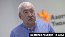 Исхак Масалиев.