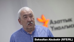 Исхак Масалиев.