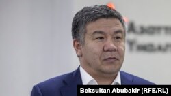 Алмамбет Шыкмаматов.