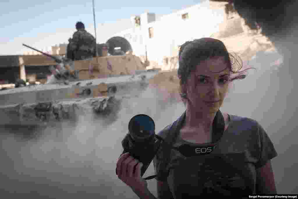 Beroyeva on assignment in Syria. As the two friends chatted in a bar in central Moscow, Romensky made the snap decision to invite his friend along to the mysterious cafe meeting. Beroyeva recalls the moments in the cafe that Pavlensky "arrived after about 20 minutes and sat across the room. He didn't talk to us or order any food, just waited for about 10 minutes, then stood up and walked out, and we followed him."