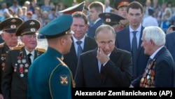 Владимир Путин во время памятных мероприятий по случаю 75-летия победы в Курской битве. 23 августа 2018 года