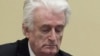ХОЛАНДИЈА -- Поранешниот лидер на босанските Срби, Радован Караџиќ, влегува во судницата на Меѓународниот резидуален механизам за кривични трибунали во Хаг, 20 март 2019 година.