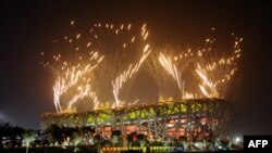 The closing ceremony of the 2008 Olympic Games in Beijing -- a massive demonstration of Chinese wealth and power.