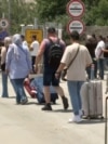 As Tehran Residents Flee, Numbers Surge At Iran's Border With Armenia