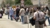 People leaving Iran via the Agarak border crossing with neighboring Armenia.