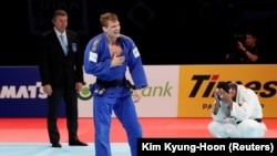 سعید ملایی در نیم‌نهایی مسابقات جهانی توکیو بازی را به حریف بلژیکی واگذار کرد