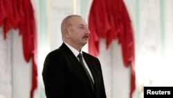Russia - Azeri President Ilham Aliyev looks on during a visit of CIS heads of state to the Peterhof Palace in Saint Petersburg, December 26, 2023.