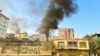 Smoke rises up from the site of explosions in Kabul on October 15.