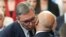 Predsednik Srbije Aleksandar Vučić ljubi Miloša Vučevića nakon što je on položio zakletvu za premijera u Skupštini Srbije, 2. maj 2024.