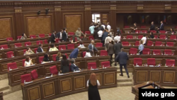 Armenia - Lawmakers clash on the Armenian parliament floor, Yerevan, July 8, 2025.