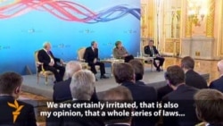 Merkel, Putin Butt Heads At German-Russian Forum