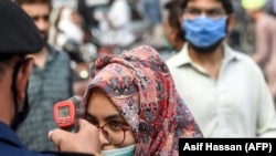 The program, widely touted by Prime Minister Imran Khan, allows authorities to monitor the whereabouts of coronavirus patients and suspected cases -- and to listen in on their phone calls.
