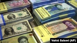 The black-market exchange rate of the Iranian rial to the U.S. dollar has plummeted in recent days. (file photo)