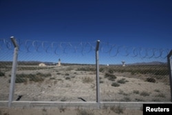 Кинеската вселенска станица зад ограда во Лас Лахас, Аргентина, на 22 јануари 2019 година.