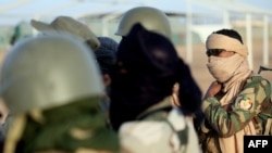 A soldier in Mali attends a training session held by French soldiers in 2021. France has accused Russia-backed mercenaries of entering the country.