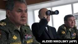 Слева направо: министр обороны РФ Сергей Шойгу. президент России Владимир Путин и начальник Генштаба РФ Валерий Герасимов. 