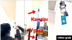 Ноокендеги добушканага илинген телефон. Видеодон алынган скриншот 