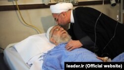 Iranian President Hassan Rohani visits Supreme Leader Ayatollah Ali Khamenei in the hospital on September 8.