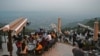 People flock to a restaurant on Margalla Hills in Islamabad on August 10 after the government announced it would be lifting most of the country's remaining coronavirus restrictions.