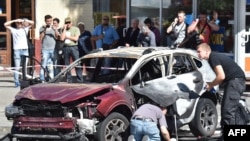 Поліцейські працюють на місці загибелі Павла Шеремета, 20 липня 2016 року