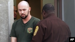 Robert Patrick Hoffman leaves U.S. District Court in Norfolk, Virginia, on December 6, 2012.