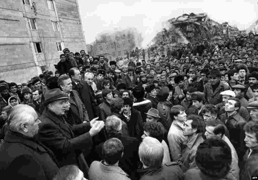 Soviet leader Mikhail Gorbachev (left) cut short a visit to New York, where he had been feted by the press and thousands of cheering Americans, to fly into Soviet Armenia's nightmare.