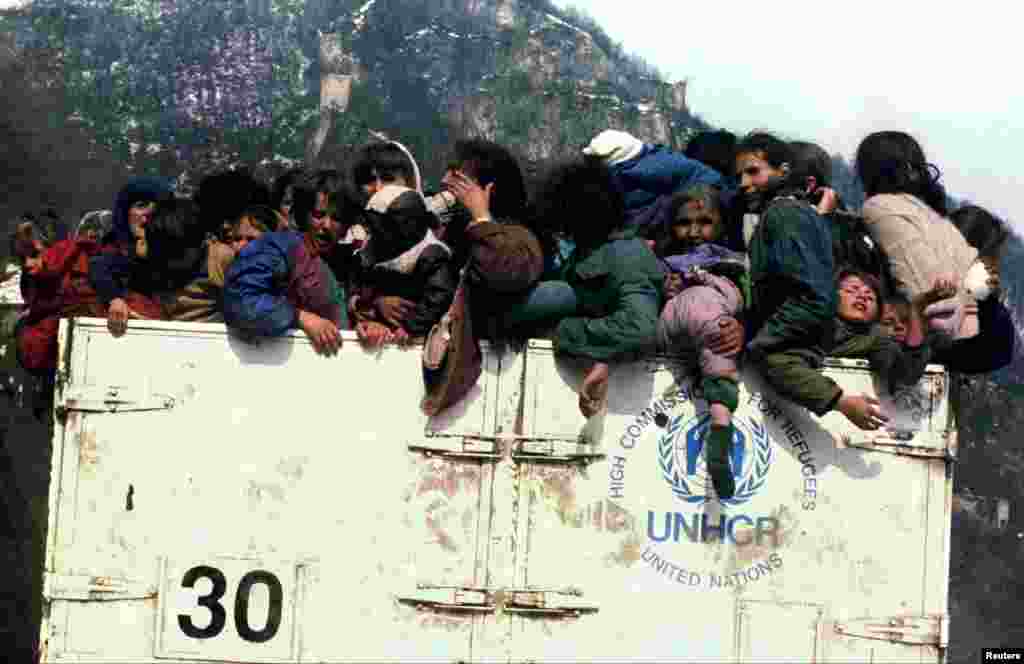 Bosnian Muslim refugees are packed into a UNHCR truck on March 31, 1993, during the evacuation of the besieged town of Srebrenica. &nbsp;An enclave in the east of the town was designated a U.N. safe haven, but four months later, in July, more than 8,000 Muslim men and boys would be slaughtered in Europe's worst massacre since World War II.