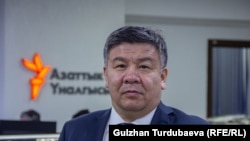 Алмамбет Шыкмаматов.