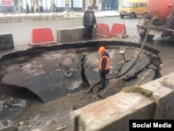 The sinkhole, which appeared in November, swallowed two cars, one of which has still not been found.