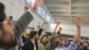 Iranian Students Disrupt Ahmadinejad's Speech