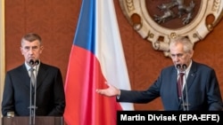 Czech President Milos Zeman (right) and newly appointed Prime Minister Andrej Babis attend a news conference at Prague Castle in Prague on June 6.