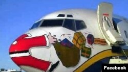 Кагылышуудан кийин.  Учакка тартылган азил сүрөт.