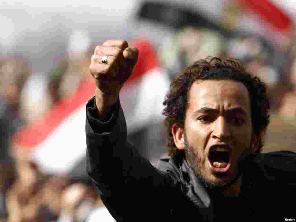 A protester shouts anti-Mubarak slogans after Friday Prayers in Tahrir Square.