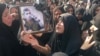 Iran Mourns Victims Of Parade Attack, Warns Of 'Devastating' Response
