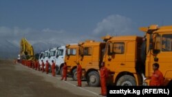 Жолдо иштеген кытайлык жумушчулар. Тогуз-Торо