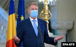 Klaus Iohannis, în timpul unui discurs către populație din timpul pandemiei.