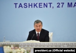 Uzbek President Shavkat Mirziyoev attends a multilateral meeting on Afghanistan aiming to lay the ground for direct talks between Kabul and the Taliban, in Tashkent in March 2018.