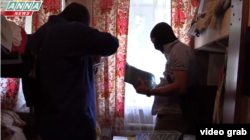 Обшук баптистської церкви у 2018 році, які показували пропагандистські канали