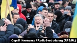 Poroshenko meets with people rallying outside St. Sophia's before the council met on December 15.