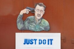 Карикатура на Игоря Гиркина, размещенная в 2014 году в Донецке