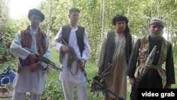 FILE: Members of an ethnic Turkmen anti-Talibn militia in northern Jawzjan Province.