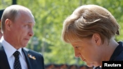 Канцлер Німеччини Анґела Меркель і президент Росії Володимир Путін. Москва, 10 травня 2015 року