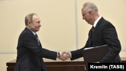 Президент РФ Владимир Путин и генеральный директор Российского фонда прямых инвестиций Кирилл Дмитриев, 1 января 2020 г.