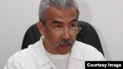 Талант Өмүрбеков.