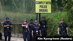 Policijske snage oko hotela Capella u kojem se održao summit dvojice predsjednika