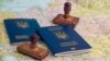 Ukraine -- Ukrainian foreign passports, stamps and map of Europe, Kyiv, 2016