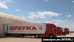 Armenia -- Heavy trucks parked at the Spayka company's facility outside Yerevan.