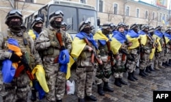 Бійці МВС України під час церемонії відправки на Донбас – до зони збройного протистояння з російськими гібридними силами. Харків, 30 січня 2015 року (ілюстраційне фото)