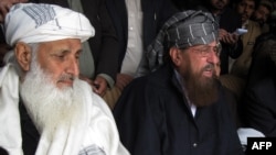 Taliban negotiators Maulana Samiul Haq and Ibrahim Khan